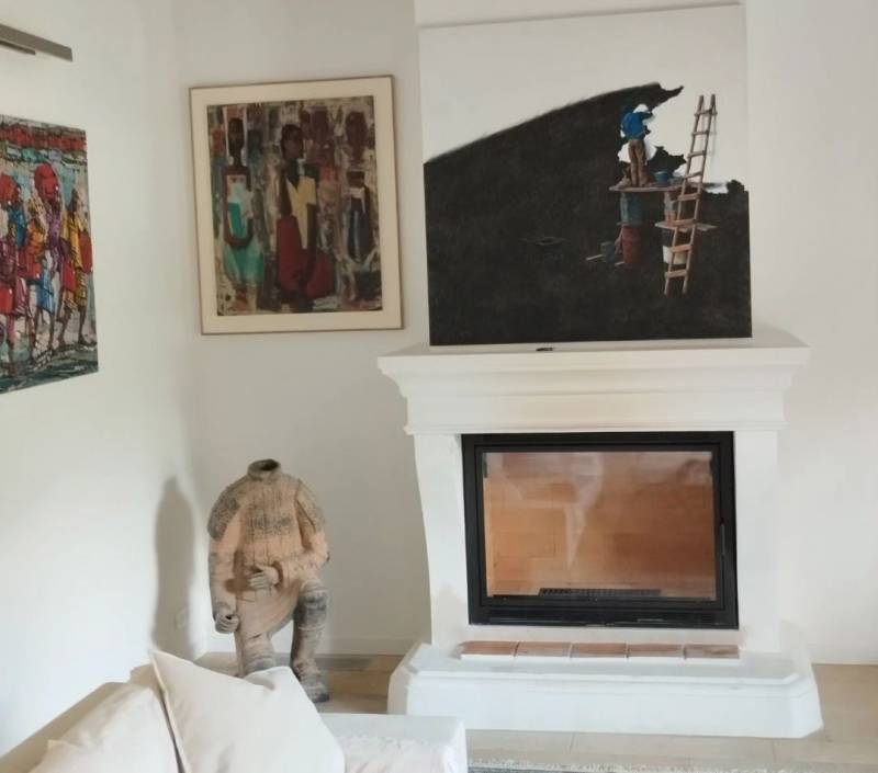 Installation d'un insert sur mesure dans une grande cheminée à Saint-Rémy-de-Provence.